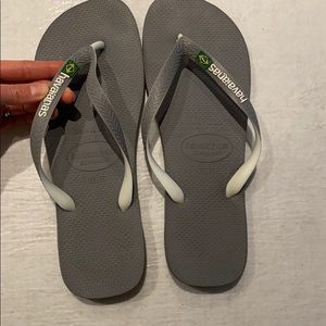 Grey flip flops